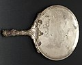 Silver mirror with Hercules-club handle similar to the one found in the House of the Greek Epigrams