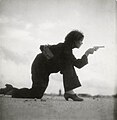 Woman training for a Republican militia by Gerda Taro, Somorrostro Beach, La Barceloneta (1936).