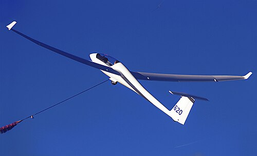 A Ventus 2a glider being winch launched