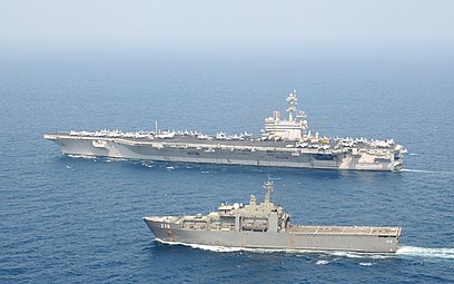USS George H.W. Bush underway with RSS Endeavour in the Gulf of Aden.