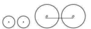 Diagram of two small leading wheels and two large coupled wheels