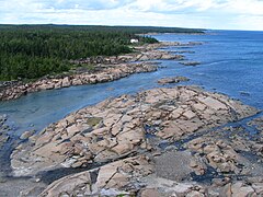 From the top of Pointe-des-Monts Lighthouse, Pointe des Monts bedrock, gulf side (East) 2004