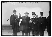 Williams (right) with President William Howard Taft (middle) and Secretary of Commerce Charles Nagel (left) on Ellis Island in 1910.