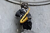 A saxophone for Manneken Pis on the 200th birthday of Adolphe Sax (6 November 2014)