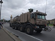 camion tracteur routier 8x6 Scania blindé et semi-remorque citerne