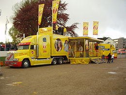 Camion publicitaire de la boisson Sinalco