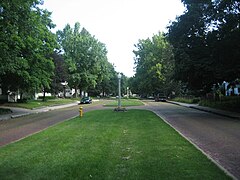 North end of White Pl, center median, looking South