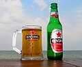 A bottle and mug of Bintang Beer