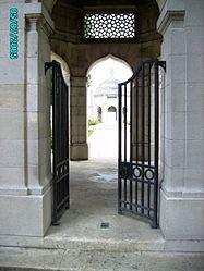 View through the entrance to the Indian Memorial to the Missing at Neuve Chapelle. In the distance is one of the memorial's two Chattri.