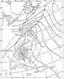 A weather chart on May 18 shows a developing tropical cyclone near the Bahamas.