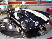 A 1965 Shelby Cobra, once owned by Carroll Shelby. The vehicles dashboard was autographed by Shelby.