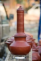 A Puttu kutti or puttu maker made of clay