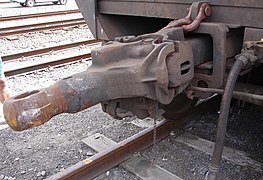 The Type F coupler on the left has lost its pin and was pulled out of its coupler pocket.