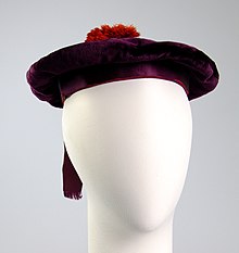 Purple velvet beret with red pompom