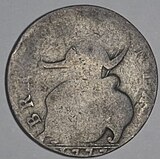 Reverse of evasion halfpenny, showing Britannia and date 1777, incompatible with obverse