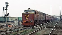 A broad gauge class WDM-1 locomotive with an evening train at Gorakhpur Junction in December 1993