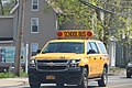 Chevrolet Suburban acting as a school bus