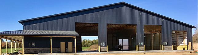 Post-frame building under construction