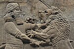 Ashurbanipal kills a lion