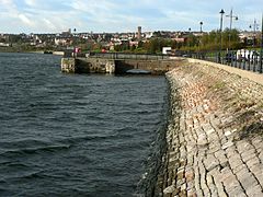 Sea wall and former tip station