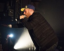 The Alchemist performing in 2014