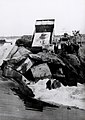 Concrete slabs being thrown into the Danube to temporarily redirect the flow of water