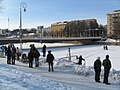 People watching the closed Myllysilta.