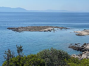 Smaller Garip Island viewed from the larger island with Lesbos in the distance