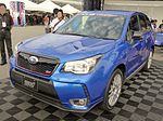 Subaru Forester STI tS, a higher-performance variant of the Subaru Forester. This photo shows the front of the car, which is blue with a small "STI" emblem on the front grille.