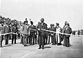 Image 18Ribbon ceremony to open the Sydney Harbour Bridge on 20 March 1932. Breaking protocol, the soon to be dismissed Premier Jack Lang cuts the ribbon while Governor Philip Game looks on. (from History of New South Wales)