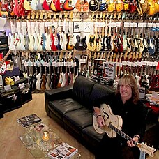 Andy at his guitar shop Fab Gear