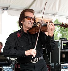Doug Kershaw playing the fiddle at the 2009 Festivals Acadiens et Créoles.