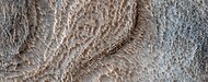 Close, color view of honeycomb terrain, as seen by HiRISE under HiWish program