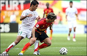 L'équipementier Puma est visible sur le maillot du joueur angolais Paulo Figueiredo, lors du match Iran-Angola (1-1).