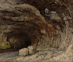 Photographie d'une peinture représentant une grotte.