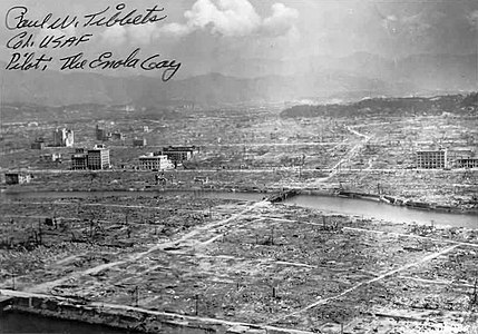 Hiroshima aftermath. Despite a true firestorm developing, reinforced concrete buildings, as in Tokyo, similarly remained standing. Signed by the Enola Gay pilot, Paul W. Tibbets.