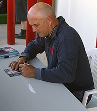 Man signing autograph