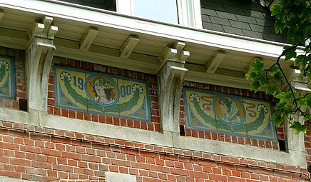 Stylized Art Nouveau festoons on Place de la Résistance no. 8, Brussels, Belgium, unknown architect or ceramist, 1900