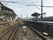 View of platforms from level crossing