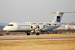 Small four-engined jetliner with high wings