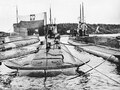 The three submarines Sęp, Ryś, and Żbik at the Marielund internment camp outside Mariefred, with the Polish flag raised on one of them.