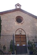 Fachada de Sant Nicolau de Portopí, co escudo da cidade de Palma