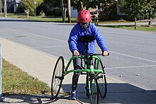 A girl walking with a RAD-Innovations RaceRunner frame