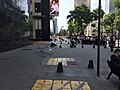 Crumbled sidewalk outside a Hilton hotel, Mexico City.