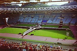 Stage with four runways in the middle of the pitch