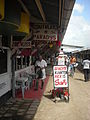 Image 26Butcher in the Central Market in Paramaribo with signs written in Dutch (from Suriname)