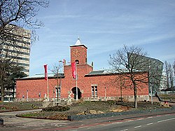 Red brick building with a central tower