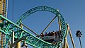 Hangtime's train as it passes over the ride's entrance