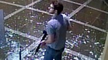 Connor Sturgeon inside the bank during the shooting