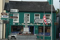 Millstreet's National Monument, on front of McCarthy's Bar, in the town's main square